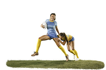 Image showing The young female rugby players isolated on white backround