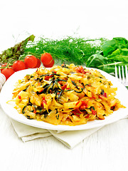 Image showing Cabbage stew with chard in plate on wooden board