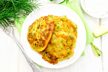 Image showing Pancakes of zucchini on board top