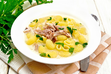 Image showing Soup creamy of chicken and pasta in plate on table