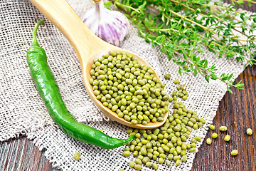 Image showing Mung beans in spoon on board