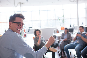 Image showing Young Business Team At A Meeting at modern office building