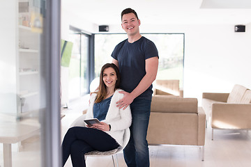 Image showing couple using tablet at home