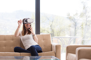 Image showing woman using VR-headset glasses of virtual reality