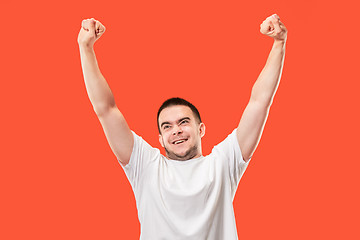 Image showing Winning success man happy ecstatic celebrating being a winner. Dynamic energetic image of male model