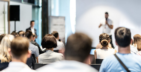 Image showing Male business speaker giving a talk at business conference event.