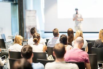 Image showing Male business speaker giving a talk at business conference event.