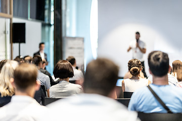 Image showing Male business speaker giving a talk at business conference event.