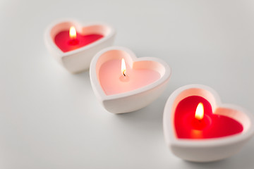 Image showing heart shaped candles burning on valentines day