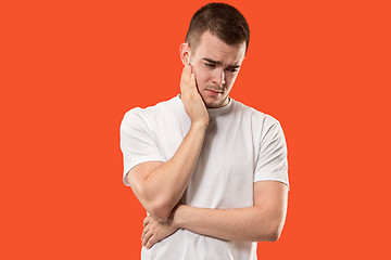 Image showing Young man is having toothache.