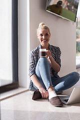 Image showing young woman drinking coffee enjoying relaxing lifestyle