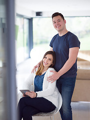 Image showing couple using tablet at home