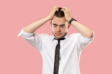 Image showing Young emotional surprised, frustrated and bewildered man