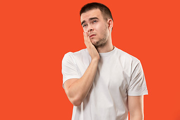 Image showing Young man is having toothache.