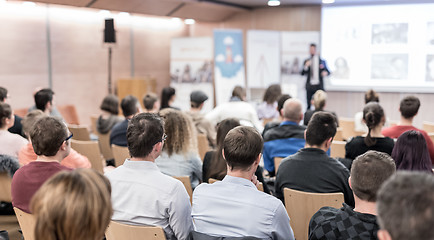 Image showing Business speaker giving a talk at business conference event.