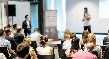 Image showing Male business speaker giving a talk at business conference event.