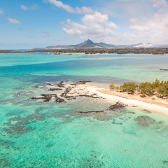 Image showing Aerial view of beautiful tropical beach with turquoise sea. Tropical vacation paradise destination of D\'eau Douce and Ile aux Cerfs Mauritius