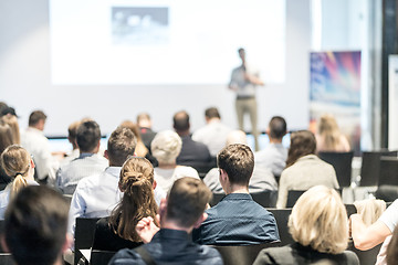 Image showing Male business speaker giving a talk at business conference event.