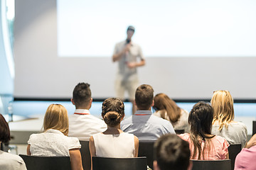 Image showing Male business speaker giving a talk at business conference event.