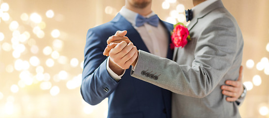 Image showing close up of happy male gay couple dancing