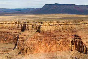 Image showing aerial view of grand canyon cliffs from helicopter