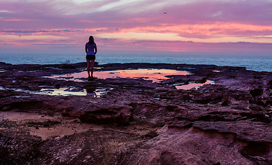 Image showing Standing in the stillness of the sunrise morning