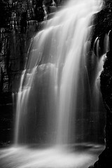 Image showing Powerful waterfall flowing down cliff ledge