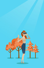 Image showing Woman wearing virtual reality headset in the park.