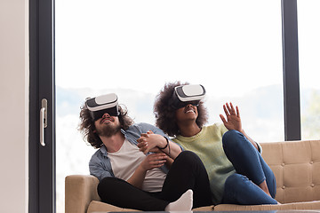 Image showing Multiethnic Couple using virtual reality headset