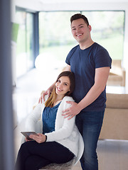 Image showing couple using tablet at home