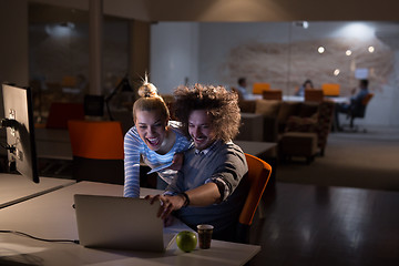 Image showing young designers in the night office