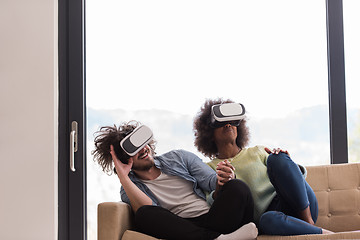 Image showing Multiethnic Couple using virtual reality headset