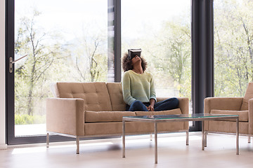 Image showing black woman using VR headset glasses of virtual reality