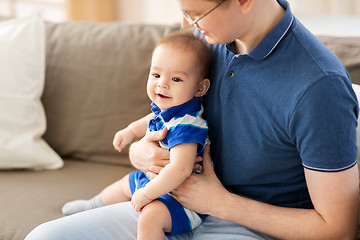 Image showing happy father with baby son at home