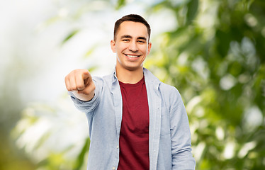 Image showing man pointing finger to you over white background