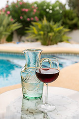 Image showing Carafe of water and glass wine