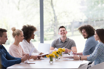 Image showing Multiethnic startup business team on meeting