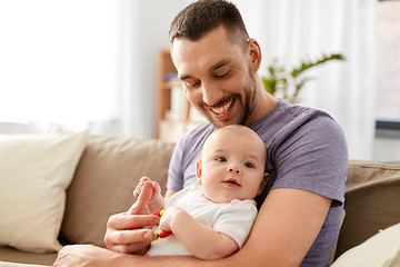 Image showing happy father with little baby daughter at home