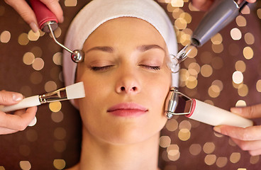 Image showing woman having hydradermie facial treatment in spa