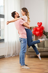 Image showing happy couple at home on valentines day