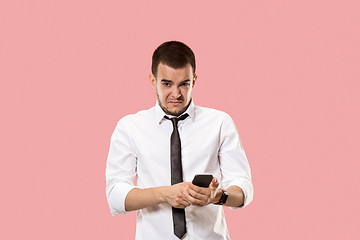 Image showing Handsome businessman with mobile phone