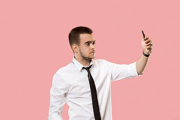 Image showing Handsome businessman with mobile phone