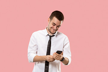 Image showing Handsome businessman with mobile phone