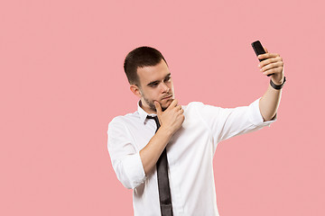 Image showing Handsome businessman with mobile phone