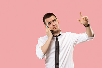 Image showing Handsome businessman with mobile phone