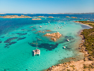 Image showing Drone aerial view of catamaran sailing boat in Maddalena Archipelago, Sardinia, Italy.