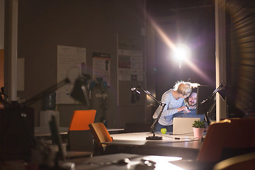 Image showing young designers in the night office