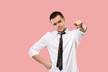 Image showing The overbearing businessman point you and want you, half length closeup portrait on pink background.