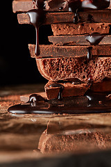 Image showing Heap of broken pieces chocolate