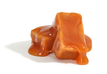 Image showing caramel candies on white background